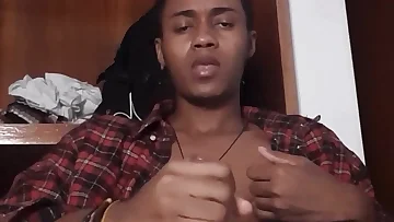 This horny Latino dude is stroking his massive uncut BBC until he can't hold back anymore. He blows a huge fucking load all over himself in his own room.