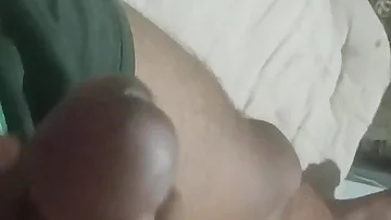 This Desi guy strokes his hard cock in a private session. He works himself to a massive homemade climax.