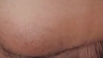 This Desi twink stretches his tight ass wide open with a homemade dildo until he's gaping. He moans with pleasure as he fucks himself deep with the sex toy.