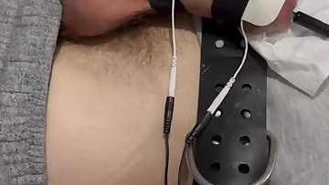 An intense BDSM session features extreme e-stim and sounding torture. The amateur bondage pushes boundaries with brutal masturbation techniques that leave him begging.