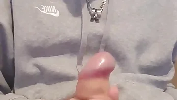 This skinny British teen shows off his massive uncut cock in his bedroom. He's young and eager to put on a show just for you.