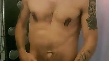 Watch this skinny Canadian amateur stroke his huge fucking cock under the streaming shower water. He works that big dick with intense focus, getting off right there in the bathroom.