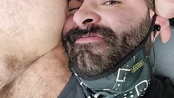 This hairy muscular man proudly displays his perfect physique. Every inch of his body is fucking magnificent and ready for action.