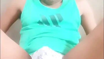 This Desi twink is fucking himself deep with a dildo while wearing just his underwear. He's taking that toy all the way in for some intense anal masturbation.