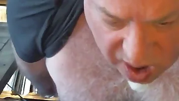 On cam, a chubby bear jerks off making another guy shoot. This mature solo session ends with explosive cumshots.