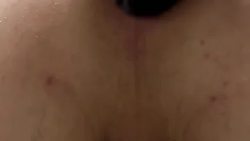 It's hard to help when his handjob turns into anal play. He slides that dildo deep while stroking himself off.
