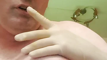 Latex gloves slide on in a dim German dungeon, setting the stage for some kinky fetish action. This mature sissy gets ready for a solo session that's both amateur and intensely hot.