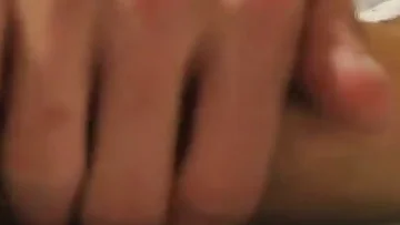 Jerking his big cock while sucking on his own toes with fetishistic enthusiasm. He brings himself to an intense orgasm through this self-pleasuring ritual.