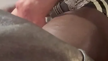 A powerful black muscle dom takes control with intense BDSM and rough titplay. This mature British amateur dominates with authority and raw fucking energy.