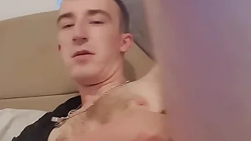 A skinny British lad struggles to handle that massive uncut cock with both hands. He's an amateur going solo, jerking himself raw until he can't take it anymore.