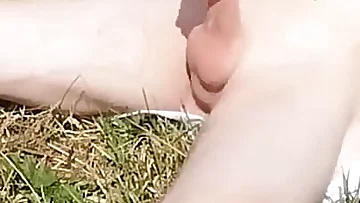 An old outdoor jerkoff vid shows a skinny guy with a big cock getting ready for summer by stroking himself outside. Watch his close-up cumshot as he unleashes his load under the open sky.