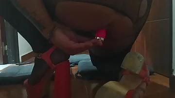Anal play with high heels leads to an incredible orgasm in this solo session. She works her sex toy deep until she erupts with a massive cumshot.