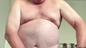 He stretches his hole wide open with a massive DP dildo in this solo session. The mature bear works himself with toys until he achieves an incredible orgasm.