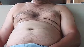 The master's pink hole gets worshipped and licked deep by a devoted fan. This fetish session focuses on intense ass licking for a big, mature bear.
