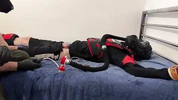 A tight twink gets wrapped in latex and subjected to relentless vibrator torment. His bondage leaves him completely vulnerable to the intense stimulation and handjob action.