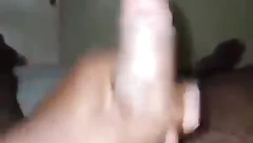 Who knew this massive black cock could feel so damn good in my hand? I stroke it hard and fast until I shoot a huge load of cum.