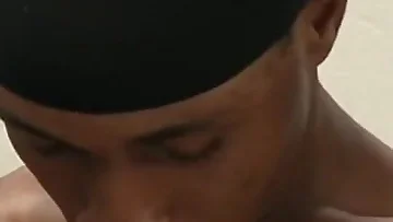 A solo black thug works his dick with intense focus. He builds up to an absolutely massive cumshot that erupts all over the place.
