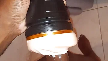 An amateur Jamaican dude jerks his enormous cock with a sex toy in this solo session. Watch him work that huge piece of meat until he blows his massive load.