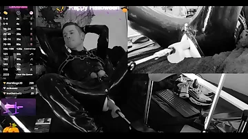Latex meets machine in this black and white anal session that'll make your head spin. The foot fetish elements and amateur webcam quality create a raw, intense experience.