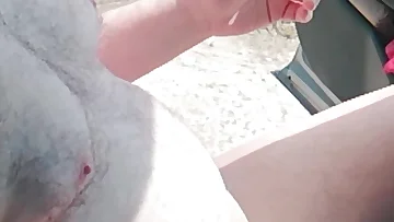 This bear jerks his small cock while wearing pantyhose out on a dirt road. He's chubby, amateur, and doesn't hold back as he works himself to completion.