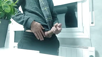 A cold guy jerks his uncut cock vigorously to warm himself up completely. This mature amateur delivers an impressive cumshot after his solo masturbation session.