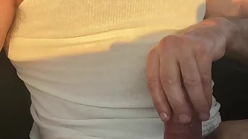 Grandpa is stroking his ringed cock at a rest stop. His big cock shoots a massive cumshot that'll make you jealous.