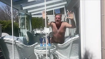 This hunk stepdaddy bear masturbates naked on the veranda, stroking his thick cock outdoors. That Canadian daddy unloads his massive cumshot after working his hairy shaft.