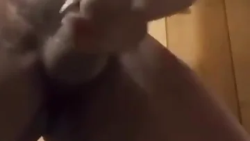 An enormous black dick gets expertly jerked off by amateur hands in this raw footage. Watch that massive cock get stroked to perfection until it blows its load.