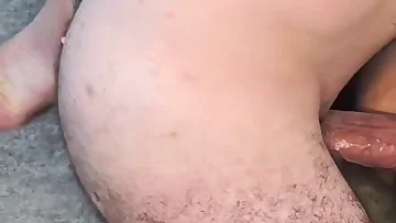 A long-legged twink gets painfully ridden by a bear in this bareback scene. This young femboy takes a rough blowjob before getting fucked hard.