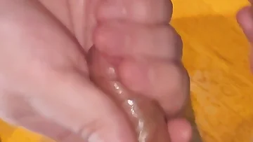 Two chubby Austrian guys rub their uncut cocks together, foreskins sliding. This European amateur handjob session is all about mutual masturbation.