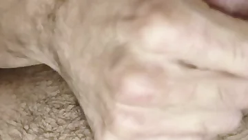 This hairy amateur guy jerks his cock with raw intensity. He shoots a huge load of cum in this solo masturbation scene.