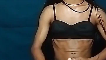 Fresh from the shower, this Indian crossdresser gets off by playing with himself. Watch her stroke her hard cock while dressed up in this solo masturbation scene.