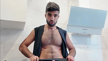 Stroking his hairy dick, he's completely lost in thoughts of your hands all over him. This amateur session builds to an intense cumshot fueled by pure fantasy.