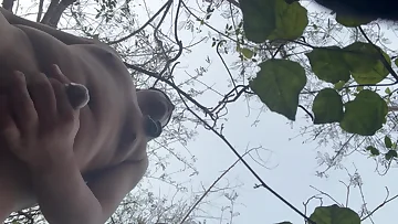This chubby Chinese bear jerks his cock outdoors until he shoots a massive load. The outdoor climax makes this solo session even more fucking hot.