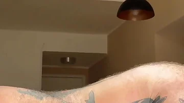 A bearded stepfather takes complete control of his tattooed bear partner in this raw Brazilian encounter. He dominates every inch of the willing submissive with intense ass licking, blowjobs, and deep anal fucking.