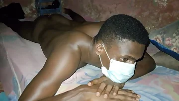 A black amateur masturbates passionately in a rustic African room setting. His young Nigerian solo performance captures raw, authentic pleasure in homemade style.