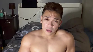 This Filipino twink jerks his hard cock in the shower, building toward an impressive cumshot. His muscular physique and amateur BDSM vibes make this bathroom session particularly hot.