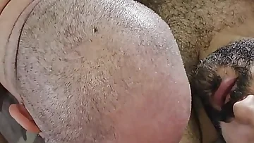 A young hairy bear gets his cock sucked by a mature Latino man. This amateur encounter blends old and young in a passionate blowjob scene.