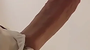 At this beach party, big cocks come out to play and stroke under the sun, showing off their massive tools. These mature men enjoy public masturbation and casual fun in the open air.