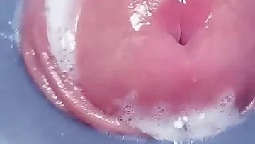 A penis machine with a new fetish attachment fucks his big uncut cock. This Russian amateur cums hard in a solo BDSM masturbation session.