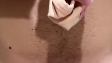 He jerks his cock with one hand and squeezes his balls with the other. This homemade solo session shows him getting off in his own private way.