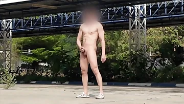This daring Thai guy can't resist jerking off in public at a secluded parking spot. He gets off on the thrill of possibly getting caught while beating his meat.