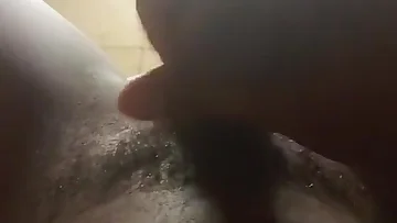 A Botswanan man strokes his hard cock in a late night solo session, working himself toward a climax. He unleashes a thick, satisfying cumshot all over himself.