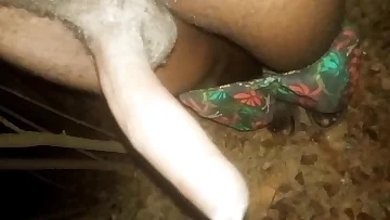 An amateur performer enjoys an outdoor solo handjob session with his massive black cock. The natural setting provides the perfect backdrop for his self-pleasuring adventure.